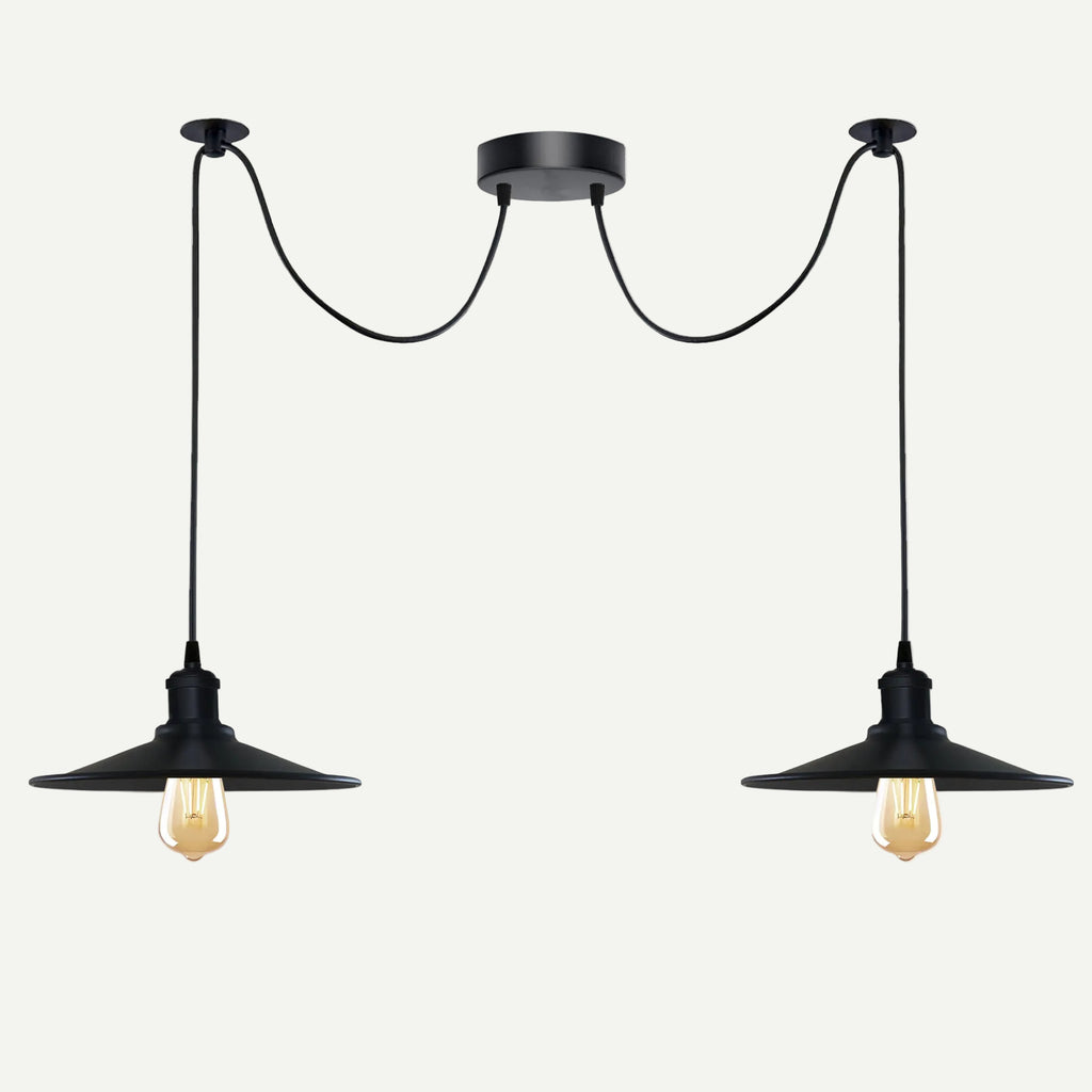 Two-head black pendant with exposed filament bulbs lit