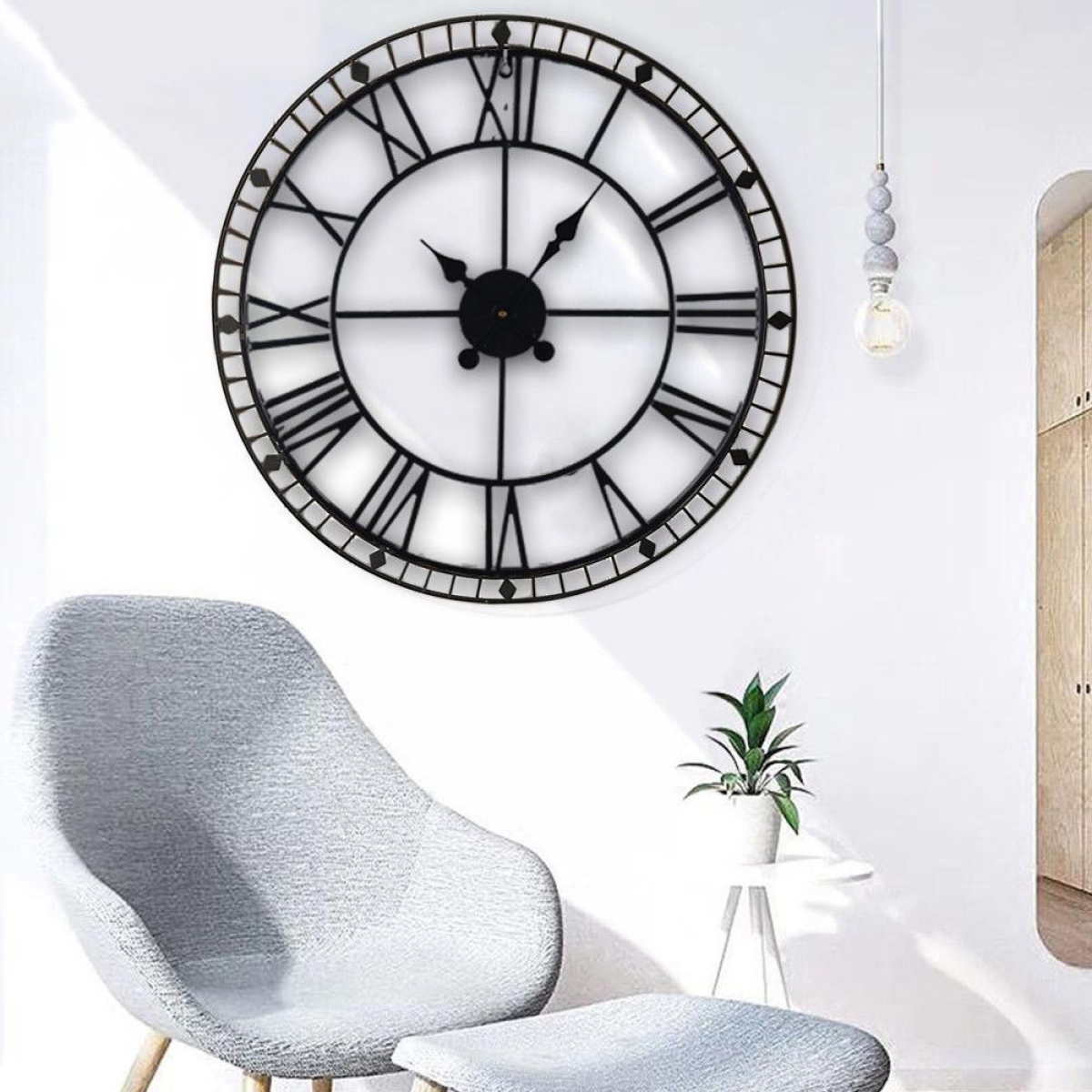 Roman numeral wall clock in blackened metal, 88cm, open frame